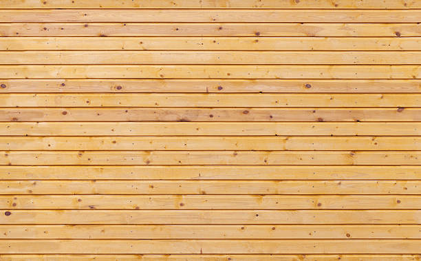istock Uncolored new wooden wall background photo texture 497410331