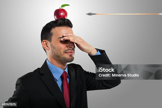 Scared Businessman Stock Photo - Download Image Now - Humor, Risk Management, Apple - Fruit