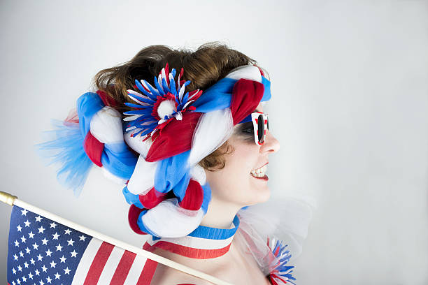 istock Woman holding American flag 497413645