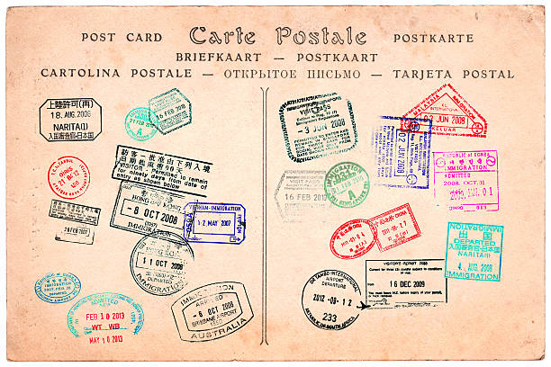 coleção de passaporte selos em um cartão postal vintage fundo - postcard french culture france postage stamp - fotografias e filmes do acervo