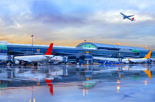 Wide angle view of parked Swiss airplanes at Zürich Kloten Airport on a sunny summer day. Photo taken July 23rd, 2023, Zurich, Switzerland.