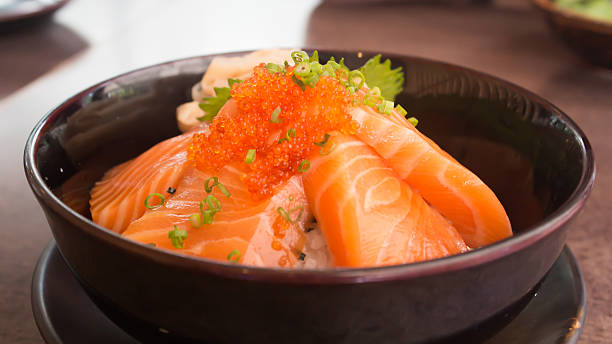 istock Salmon with rice in bowl 497418470