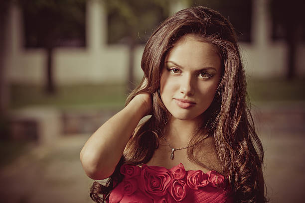 istock woman in red dress 497419158