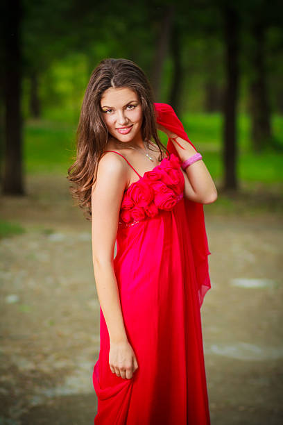 istock woman in red dress 497419836