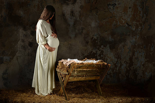 istock Pregnant Mary Looking at the Manger 497422972