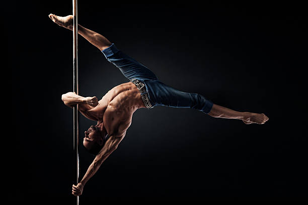 pole dance masculino - male stripper imagens e fotografias de stock