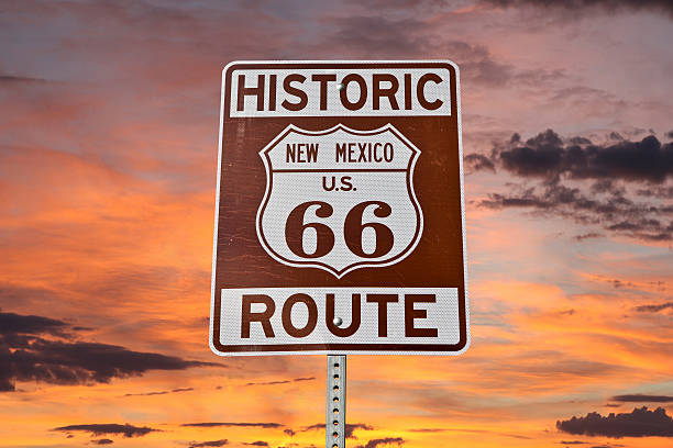 Old Route 66 New Mexico Sign With Sunset Sky Historic Route 66 New Mexico sign with sunset sky. route 66 sign old road stock pictures, royalty-free photos & images