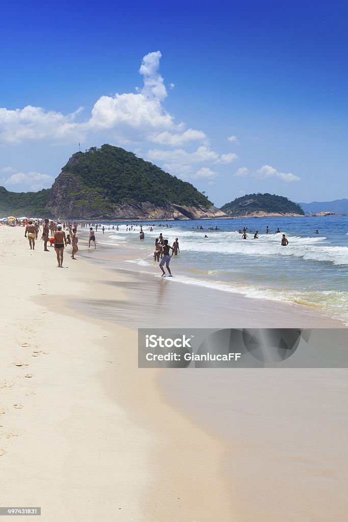 crowd of people at Copacabanain Rio de Janeiro Brazil crowd of people at Copacabana beach in Rio de Janeiro, Brazil Beach Stock Photo