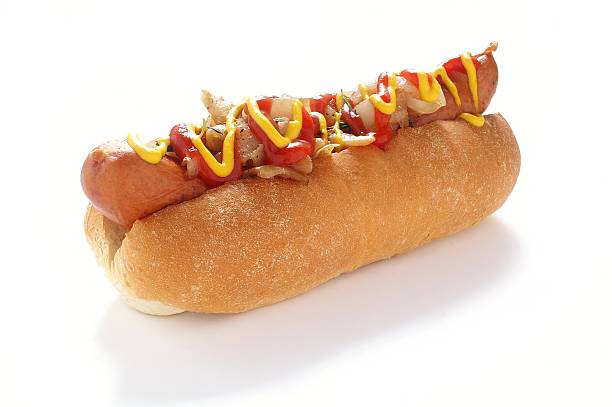 istock hot dog with onions ketchup and mustard isolated on white 497431859