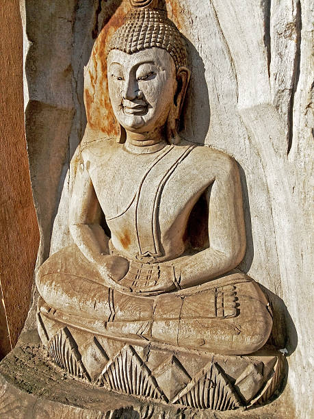 istock Buddha face  of wood 497432567