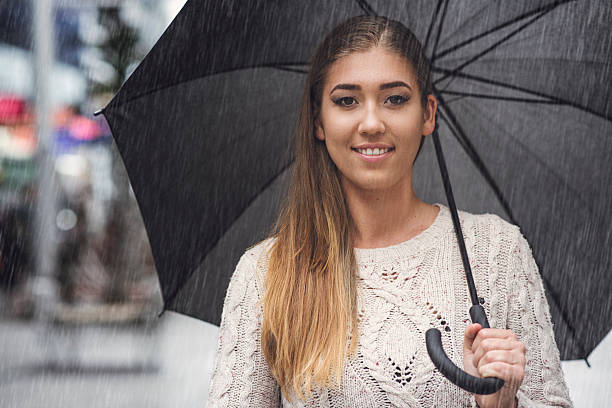 istock Even The Rain can not Ruin Her Positivity. 497441416
