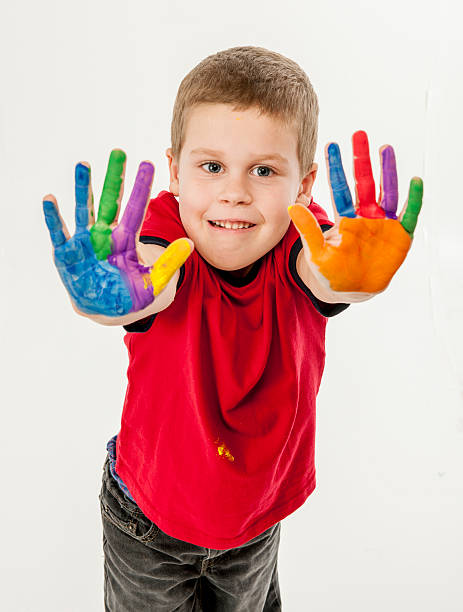 istock Little Boy Showing His Painted Hands 497441542