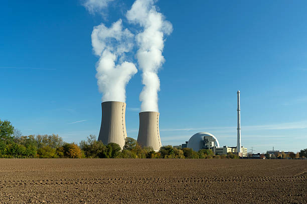 istock Nuclear power plant on sky background in sunlight 497441650