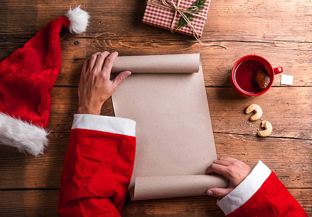 istock Santa Claus and wishlist 497442446