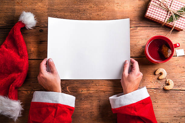 istock Santa Claus and wishlist 497442722