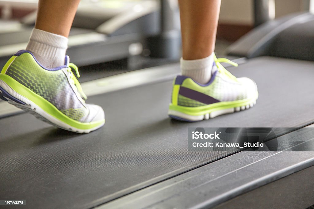 Women runner on the treadmill Sock Stock Photo