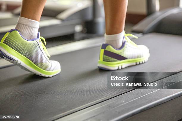 Women Runner On The Treadmill Stock Photo - Download Image Now - Sock, Sport, 2015