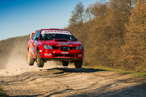 Subaru Impreza WRX STI  competes at the annual Rally Galicia Lviv, Ukraine - November 1, 2015: Oleg Sobolew's Subaru Impreza WRX STI  competes at the annual Rally Galicia near the city of Lviv, Ukraine hopper car stock pictures, royalty-free photos & images