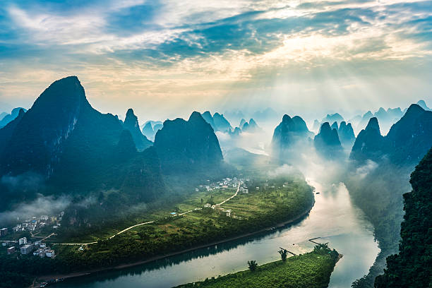 Landscape of Guilin Landscape of Guilin, Li River and Karst mountains. Located near The Ancient Town of Xingping, Yangshuo County, Guangxi Province, China. yangshuo stock pictures, royalty-free photos & images