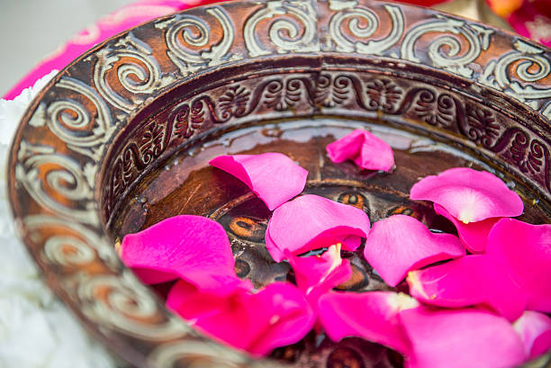 Pink flower petals in a ornate pot
