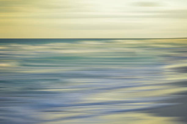 istock Digital art, streak effect blur motion, Sunrise on Cuba beach 497444876