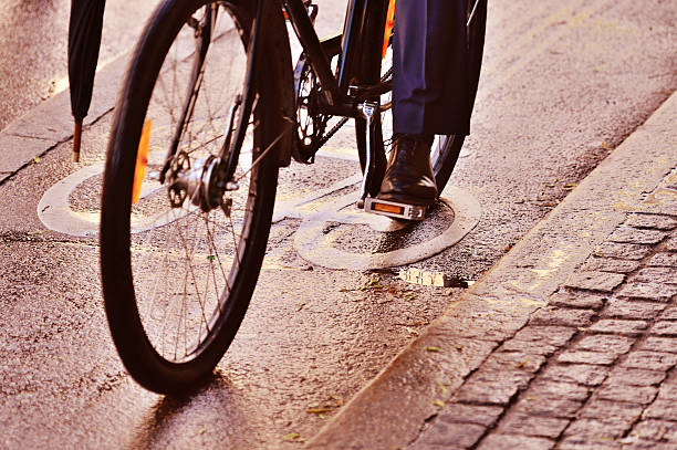 istock Bike lane, wet asphalt, and bicycle 497445554