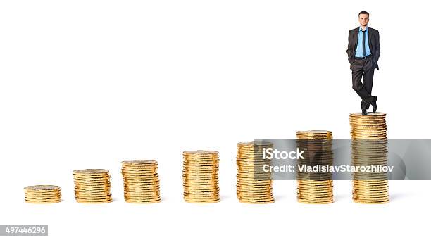 Businessman On Top The Gold Coins Stock Photo - Download Image Now - Achievement, Adult, Adults Only