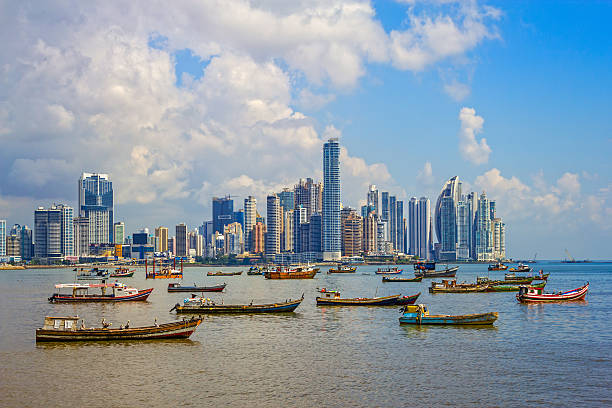 Panama City and Harbor Republic of Panama Photo of the skyline of Panama City and harbor with many fishing boats in the Republic of Panama. panama city panama stock pictures, royalty-free photos & images