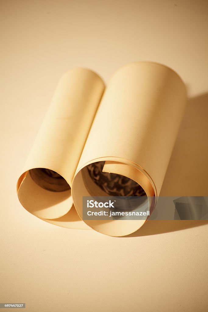 Vintage scroll against a sepia background 1930-1939 Stock Photo