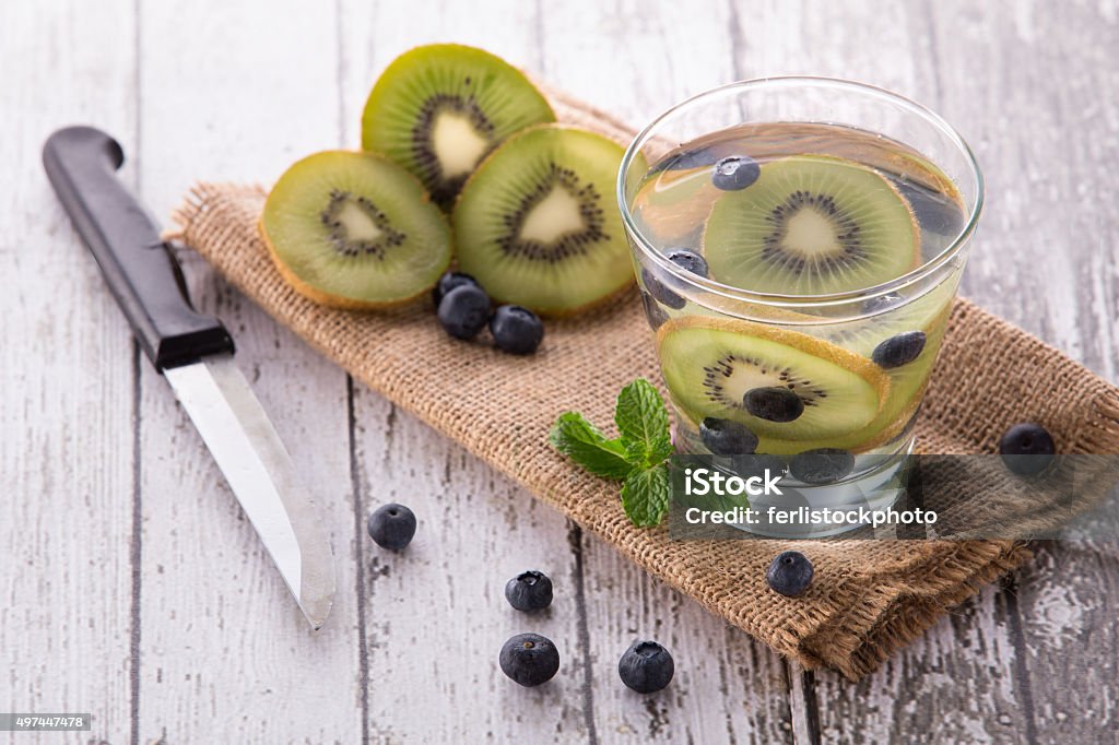 fresh fruit Flavored infused water mix of Kiwi and bluberry Summer fresh fruit Flavored infused water mix of Kiwi and bluberry 2015 Stock Photo