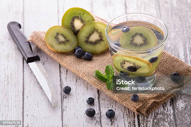 Fresh Fruit Flavored Infused Water Mix Of Kiwi And Bluberry Stock Photo - Download Image Now