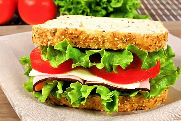 istock Sandwich with meat, tomato, lettuce and cheese 497447829