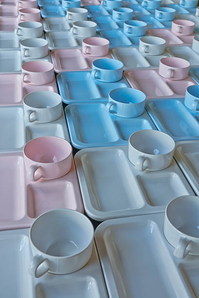 istock group of  cups and plates for serving 497449239