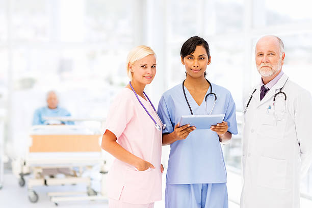 istock Medical Team Holding Digital Tablet In Hospital 497451091