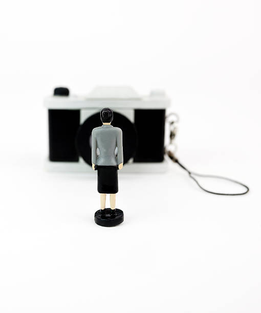 istock Businesswoman and Camera 497453223