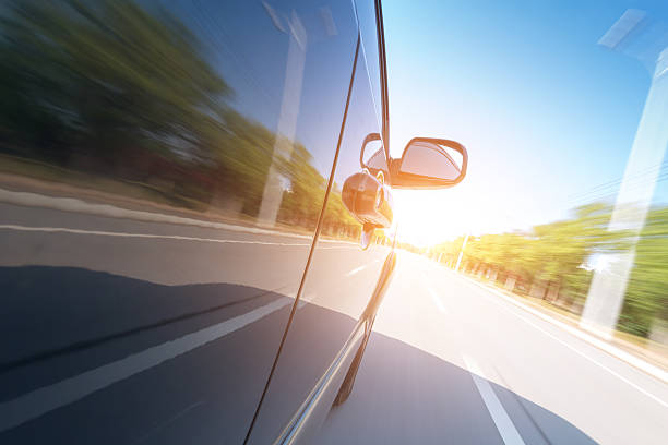 istock car on the road with motion blur background 497454101