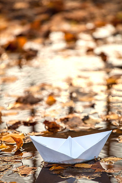 istock Origami paper boat 497467145