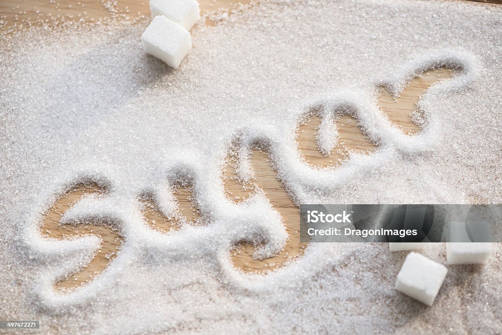 registration Inscription sugar made into pile of white granulated sugar Sugar - Food Stock Photo