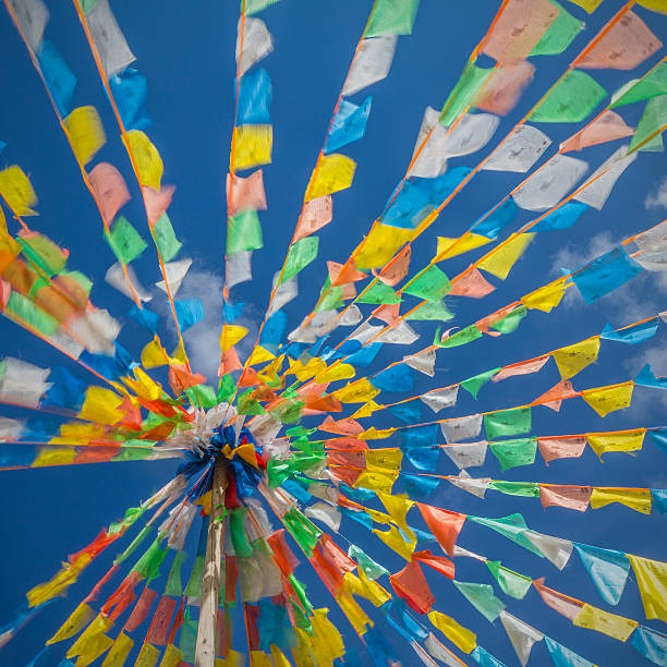 istock Buddhist tibetan prayer flags waving in the wind 497472751