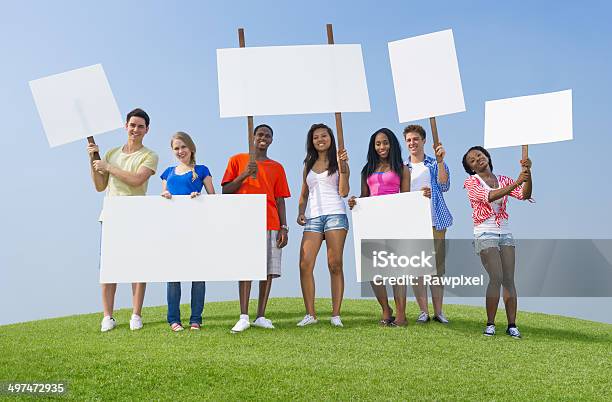Protesting Crown With Signs Stock Photo - Download Image Now - Protest, Teenager, Adolescence