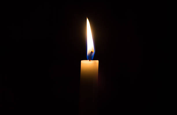istock Candle in the dark 497473503