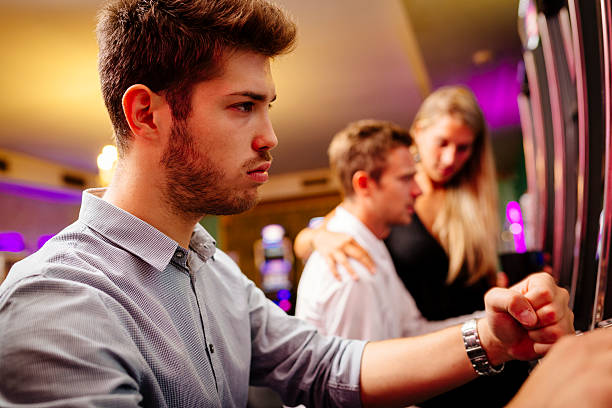 istock Group of Friend Playing with Slot Machines 497479730