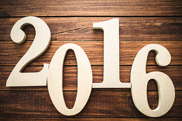 istock wooden 2016 New year text on plank wood 497481174