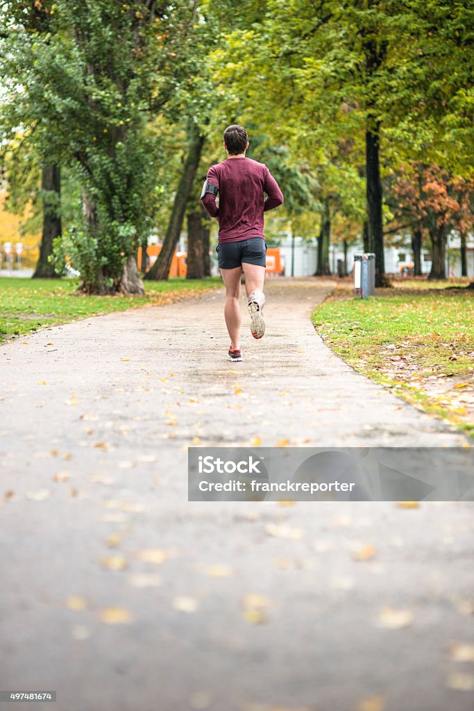 Fitness man running in Berlin rear view Fitness man running Jogging Stock Photo