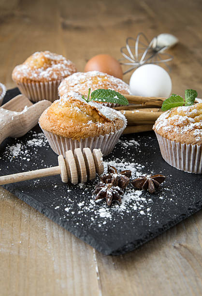 istock Homemade muffins with star anise, cinnamon and mint 497482024