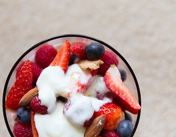 istock Fresh yogurt with fruits and muesli on breakfast 497486332