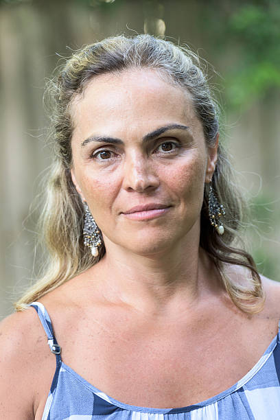 istock Mature hispanic woman smiling 497486660
