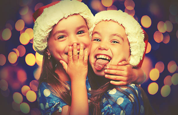istock Christmas Happy funny children twins sisters 497487252