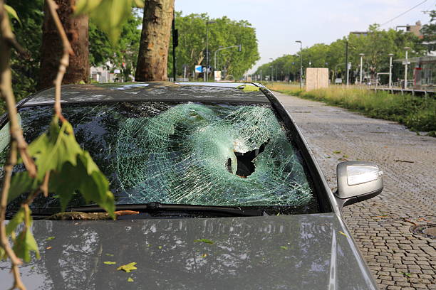 destroyed windshield storm damage stock photo