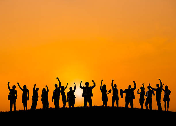 istock Business People Standing Outdoors Celebrating Success 497488063